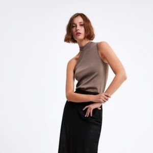 KNIT TOP WITH CUT-OUTS